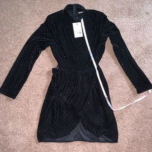 Never worn black long sleeve dress.